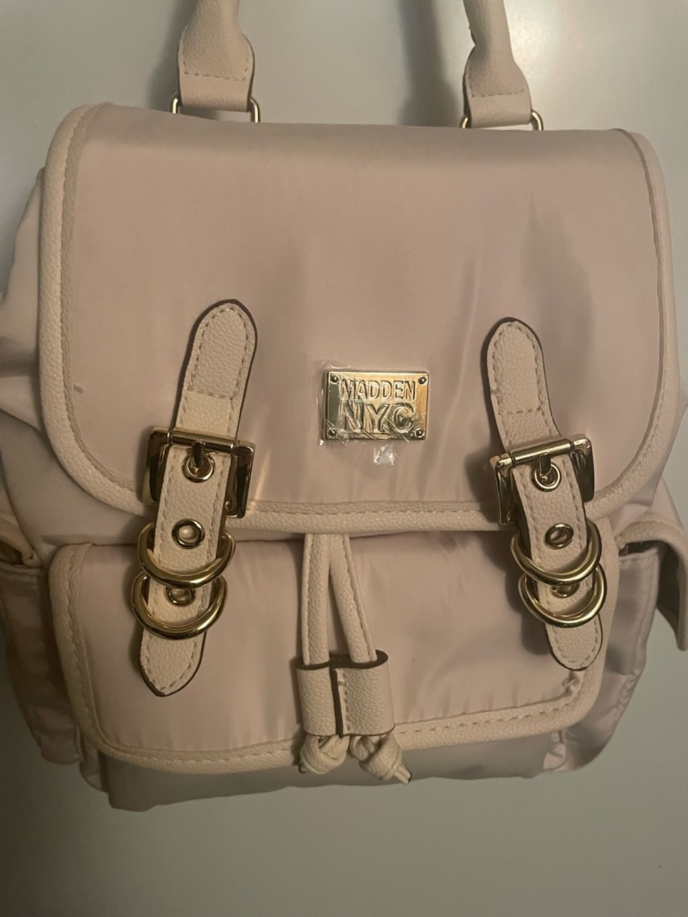 Steve Madden NYC  Women’s Buckle Flap Backpack  New With Tags, Cream